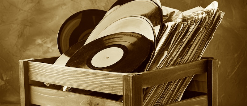 A wooden crate of old 33 RPM records.